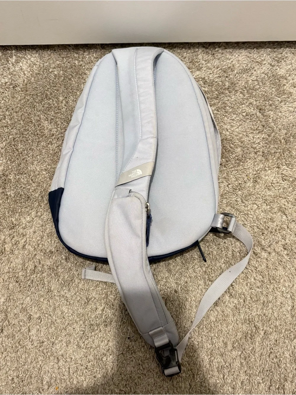 The North Face White and Navy Sling Backpack